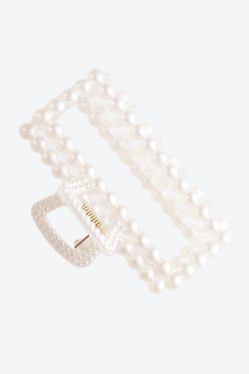 Caiman con perlas