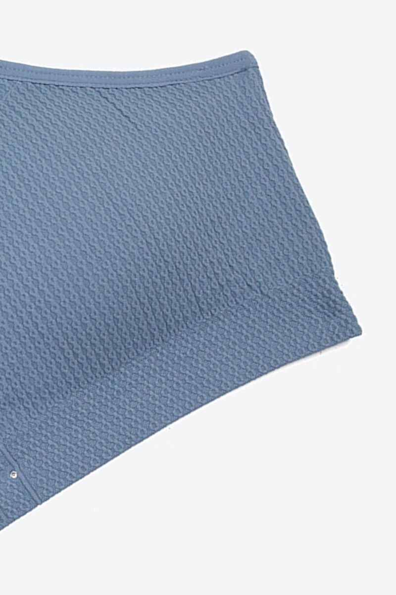 Top-x2-tipo-seamless-con-tirantes-cruzados-y-textura-espiga.MJ138-038_000123_5
