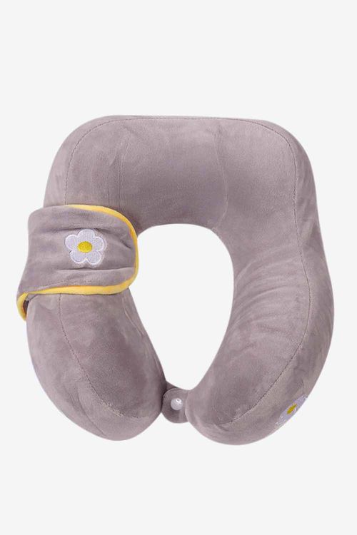 Almohada de viaje con antifaz incluido