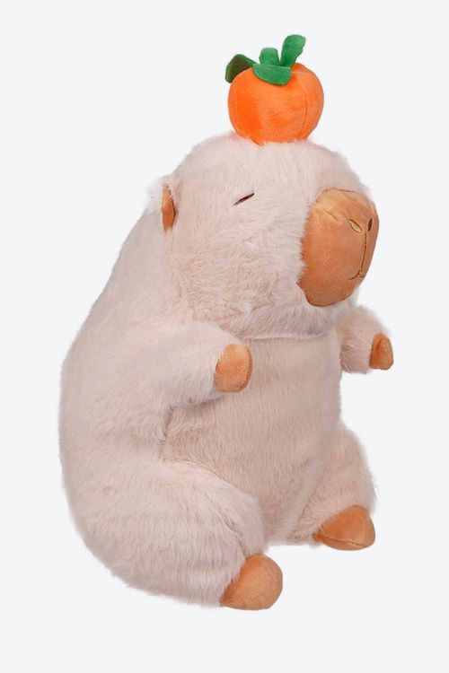 Peluche de un capibara con fruta