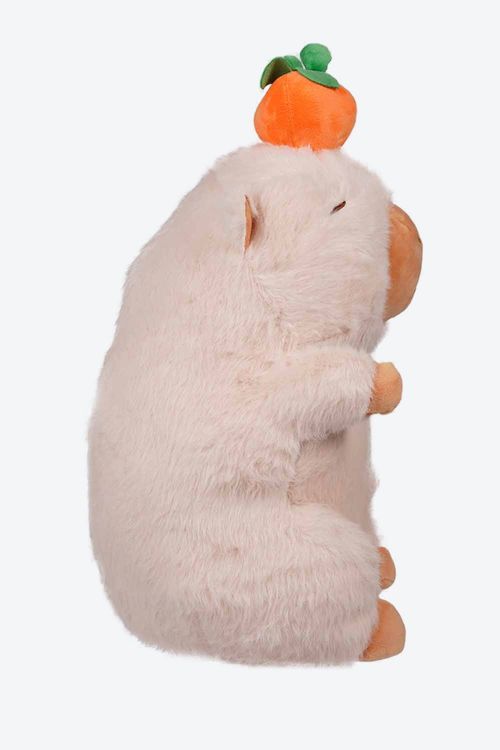 Peluche de un capibara con fruta