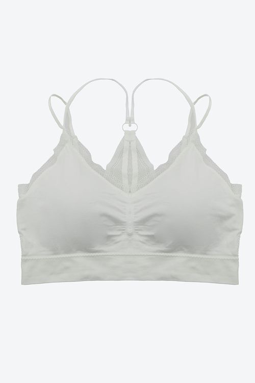 Top escote triangular elaborado en poliamida con tecnologia seamless